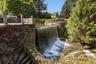 Waterfall next to The Mill House cascading into Rock Cavern