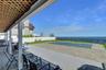 Deck with a patio area, a fenced backyard, a water view, and outdoor dining area