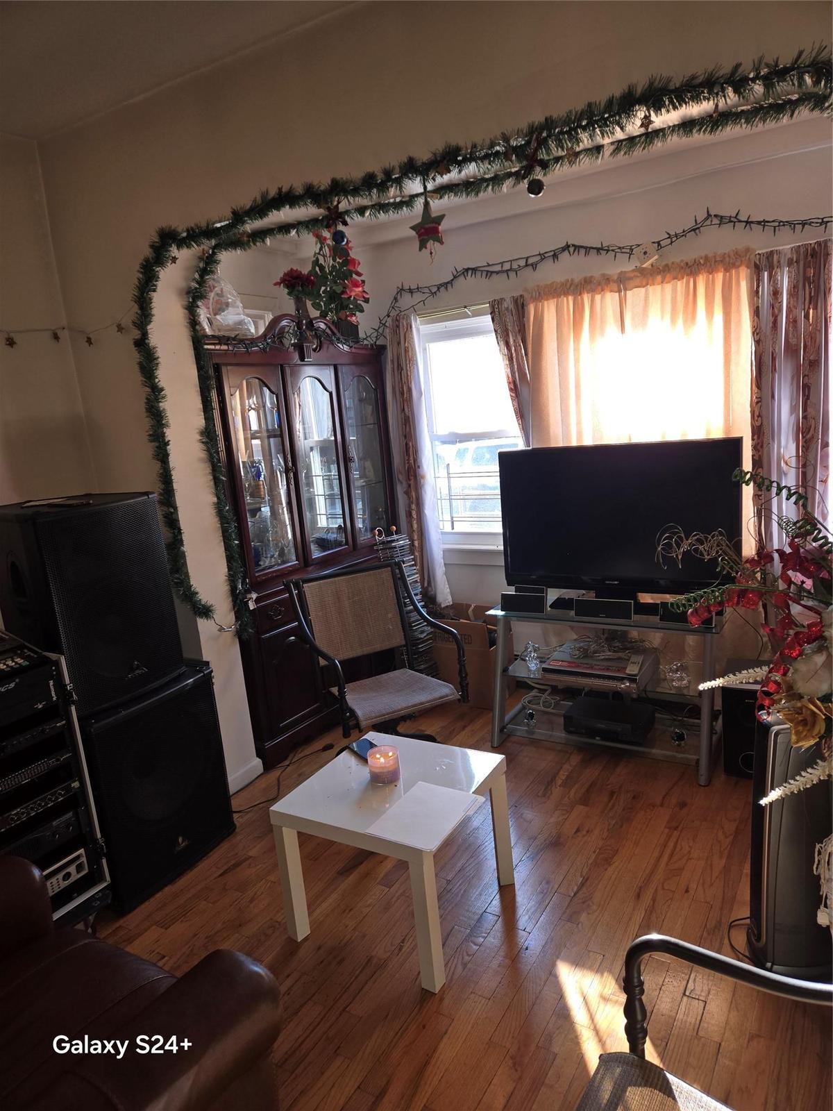 Living room featuring hardwood / wood-style floors