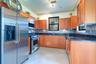 Light and bright kitchen with water views from either window as you cook!