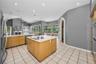 Kitchen with Jenn-Aire cooktop in island