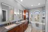 And an updated bath featuring a dual sink vanity