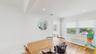 Dining room with crown molding, visible vents, radiator heating unit, and light wood finished floors