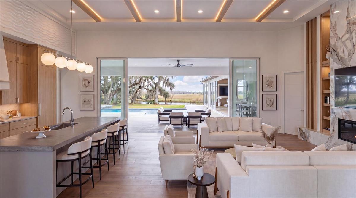 Expansive sliders that create a beautiful transition to the pool
