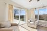 Sunroom / solarium featuring vaulted ceiling, a baseboard heating unit, wooden ceiling, and recessed lighting