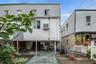 Well-established fig tree is loaded! Level backyard ideal for alfresco dining.
