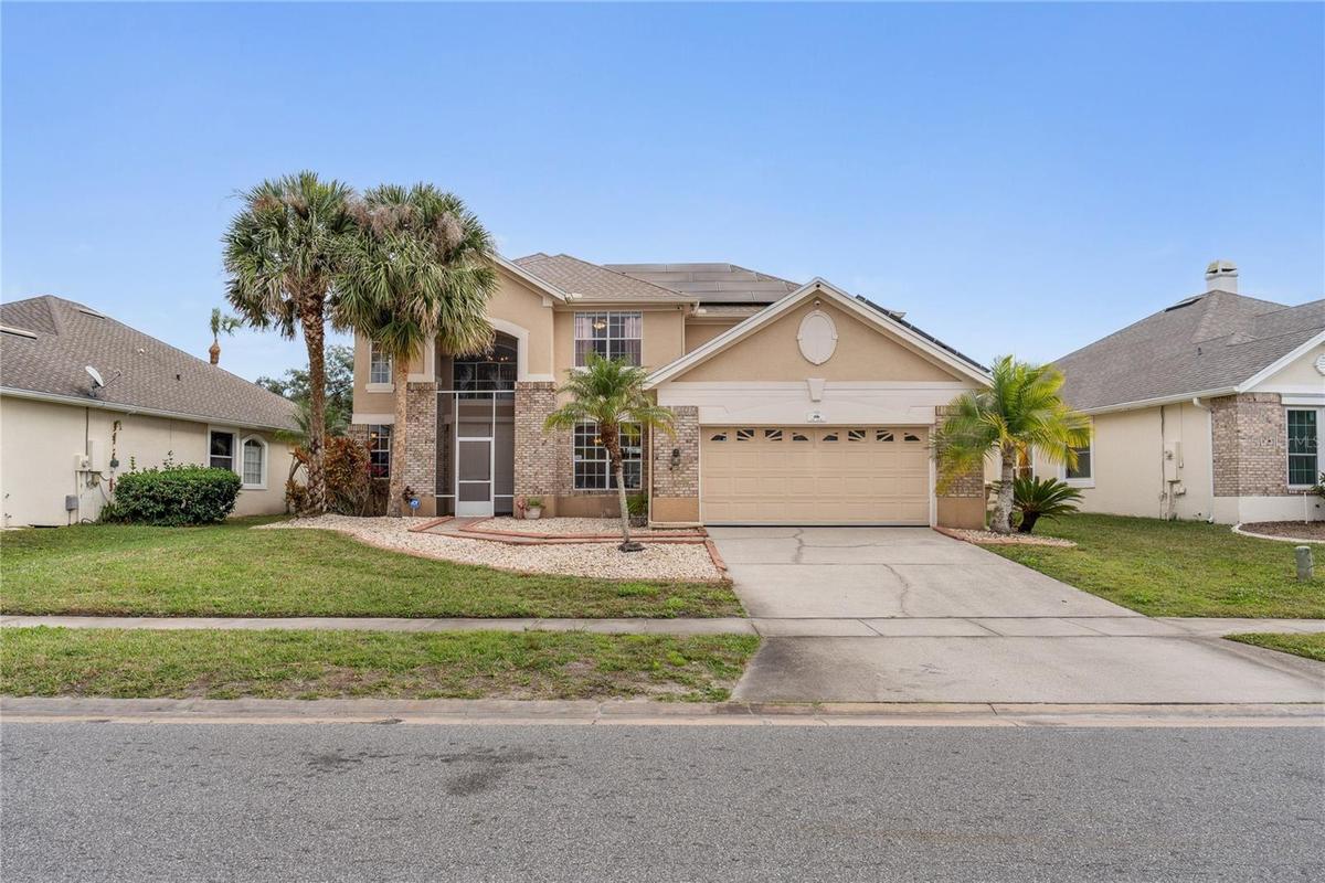 Golf-front pool home at the Oaks National Golf Club.located on the 13th hole with a generous footprint and premium lot