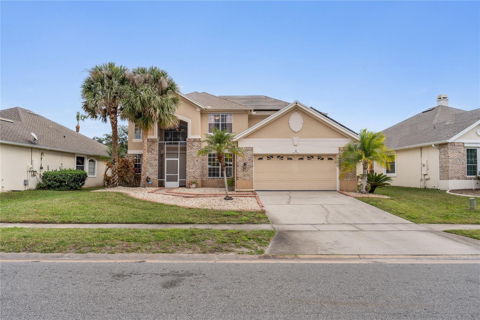 Golf-front pool home at the Oaks National Golf Club.located on the 13th hole with a generous footprint and premium lot