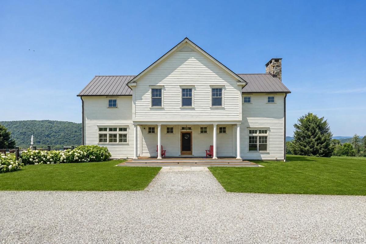 A Lovely Porch at the Back of the Home Makes a Lovely Place to Sit and Greet Arriving Guests or Watch the Sun Rise