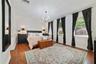 The spacious MAIN FLOOR PRIMARY SUITE offers 4 windows that let the natural light pour in, a WALK-IN CLOSET and well-appointed private en-suite bath.