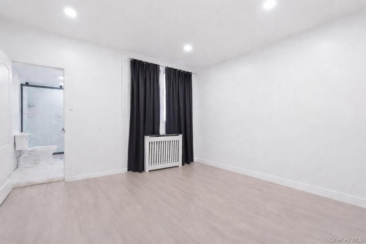 1st Floor Master bedroom with a bathroom