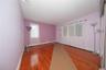 Glossy hardwood floors, walk in closet.