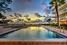 Seaside pool, spa, sun deck, and outdoor kitchen are absolutely glorious at sunset.