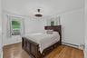 Spacious primary bedroom offers a comfortable and inviting retreat with plenty of natural light.