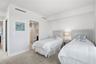 Bedroom #2 is arranged with twin beds, but a queen sized bed can easily fit and all bedrooms have ensuite bathrooms.