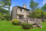 Multi-level wood deck with matching railings and stairs