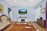 Sun-filled living room with a warm, welcoming atmosphere.