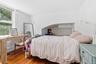 A spacious and versatile upstairs fourth bedroom offering comfort, flexibility, and abundant natural light.