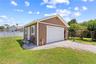 Detached 20x20 workshop w/ garage door opener.