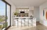 Kitchen with a peninsula, healthy amount of natural light, a kitchen breakfast bar, and recessed lighting