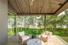 Sunroom / solarium with vaulted ceiling and healthy amount of natural light