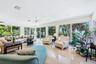 Extended living room/family room has panoramic views overlooking the Gulf