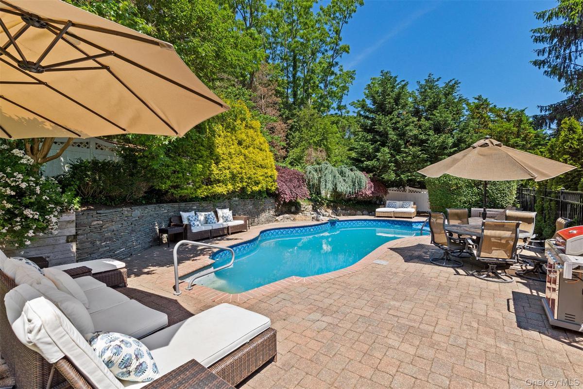 View of swimming pool featuring an outdoor living space, a patio, outdoor dining area, area for grilling, and a fenced backyard