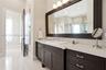 His & Hers sides, each with their own water closets