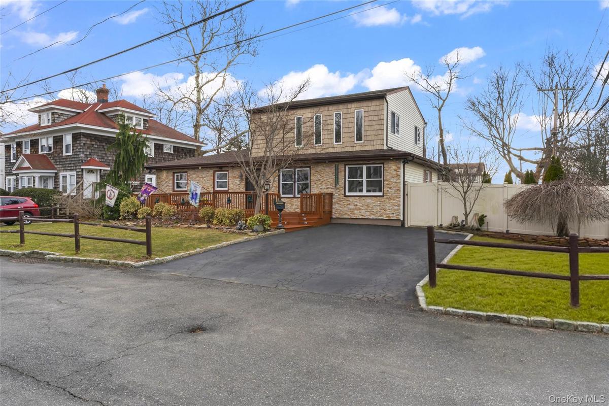 Wide driveway for convenience.