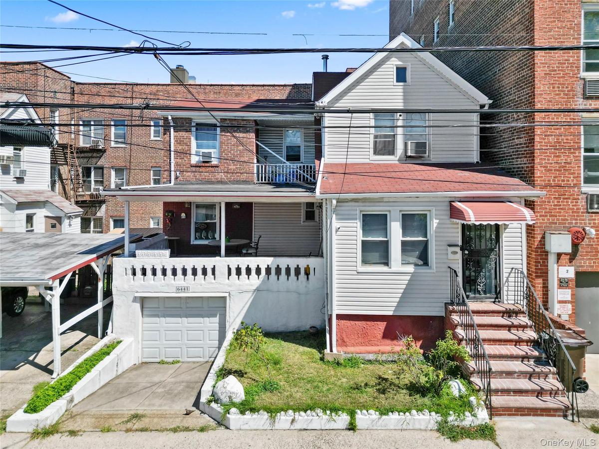 Traditional home with driveway and an attached garage