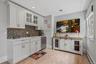 The beverage bar keeps cold drinks on hand and wet bar area makes clean up easy.