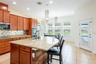 Kitchen and great room overlooks the lanai and pool.