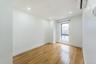 Spare room with light wood finished floors and recessed lighting