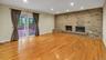 Unfurnished living room with light wood-style flooring, baseboards, visible vents, and recessed lighting