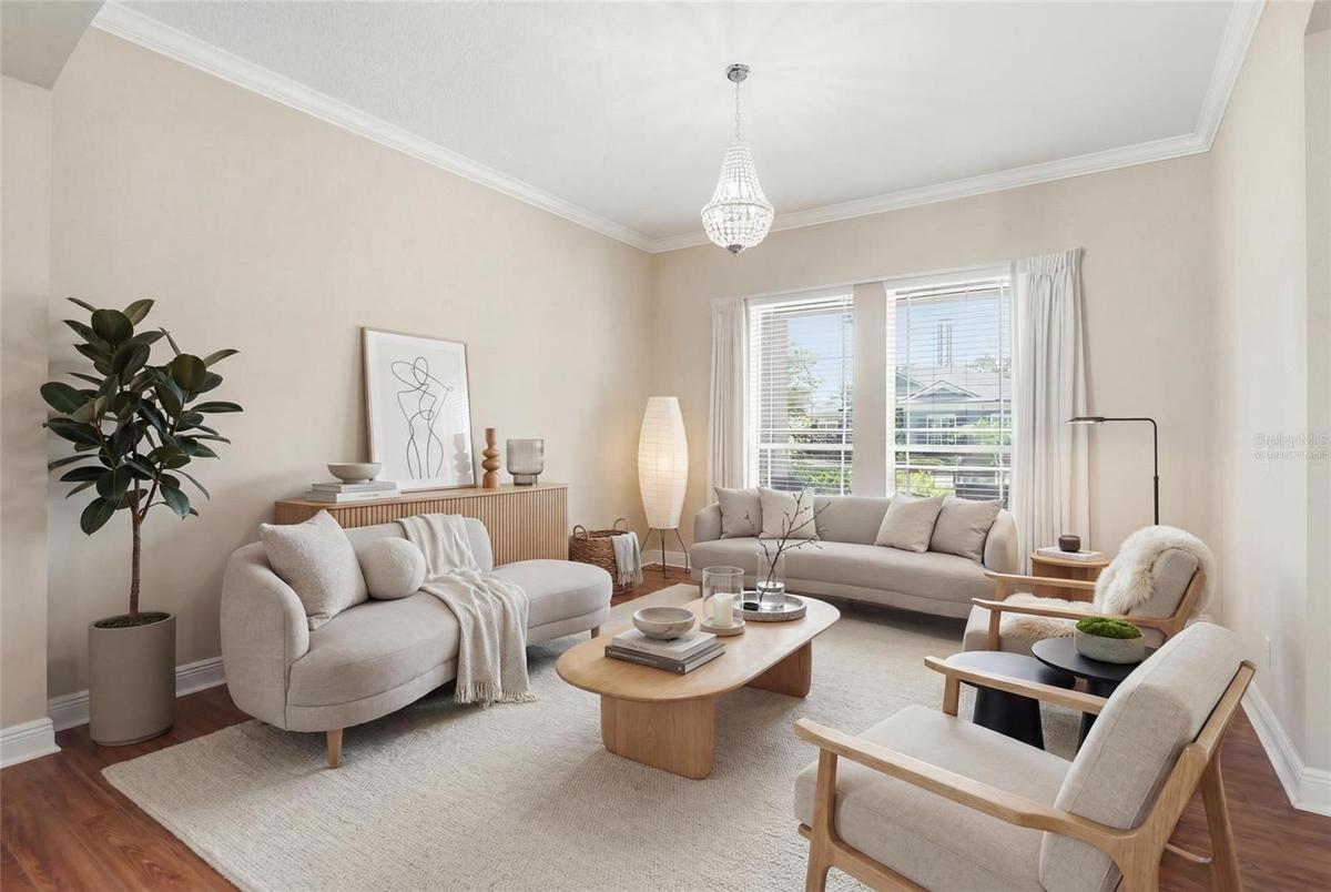 Virtually staged living room at the front of the home