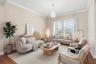 Virtually staged living room at the front of the home
