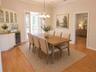Virtually Staged formal dining room and built in hutch and wine cooler