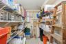 This is the extra storage room the owners made by putting up a wall in the garage. The wall can be removed to convert back to a 2 car tandem garage.