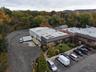Drone / aerial view of a heavily wooded area