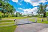 Automated Front gate controlled from smart phones and remotes.