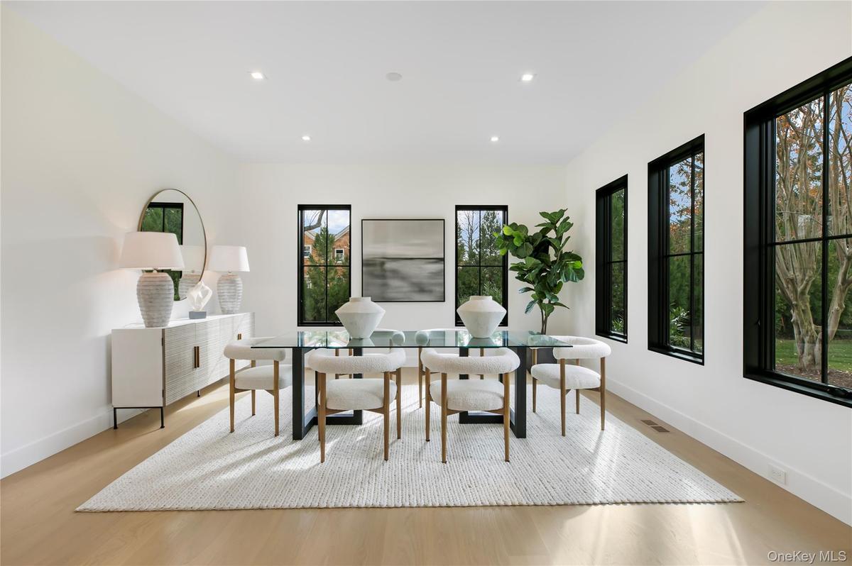 Dining space featuring light wood-style flooring and recessed lighting