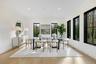 Dining space featuring light wood-style flooring and recessed lighting