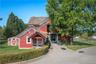Renovated barn, now a stylish clubhouse with a 2-bedroom apartment above and a manager's office attached.