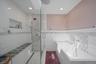 Full bathroom featuring a shower stall, a bath, tile walls, and recessed lighting