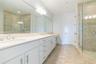Primary ensuite is modern, large with separate water room, soaker tub, shower