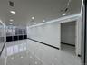 Empty room with marble finish floor, visible vents, and recessed lighting