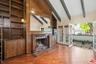 Walls of bookcases in Den