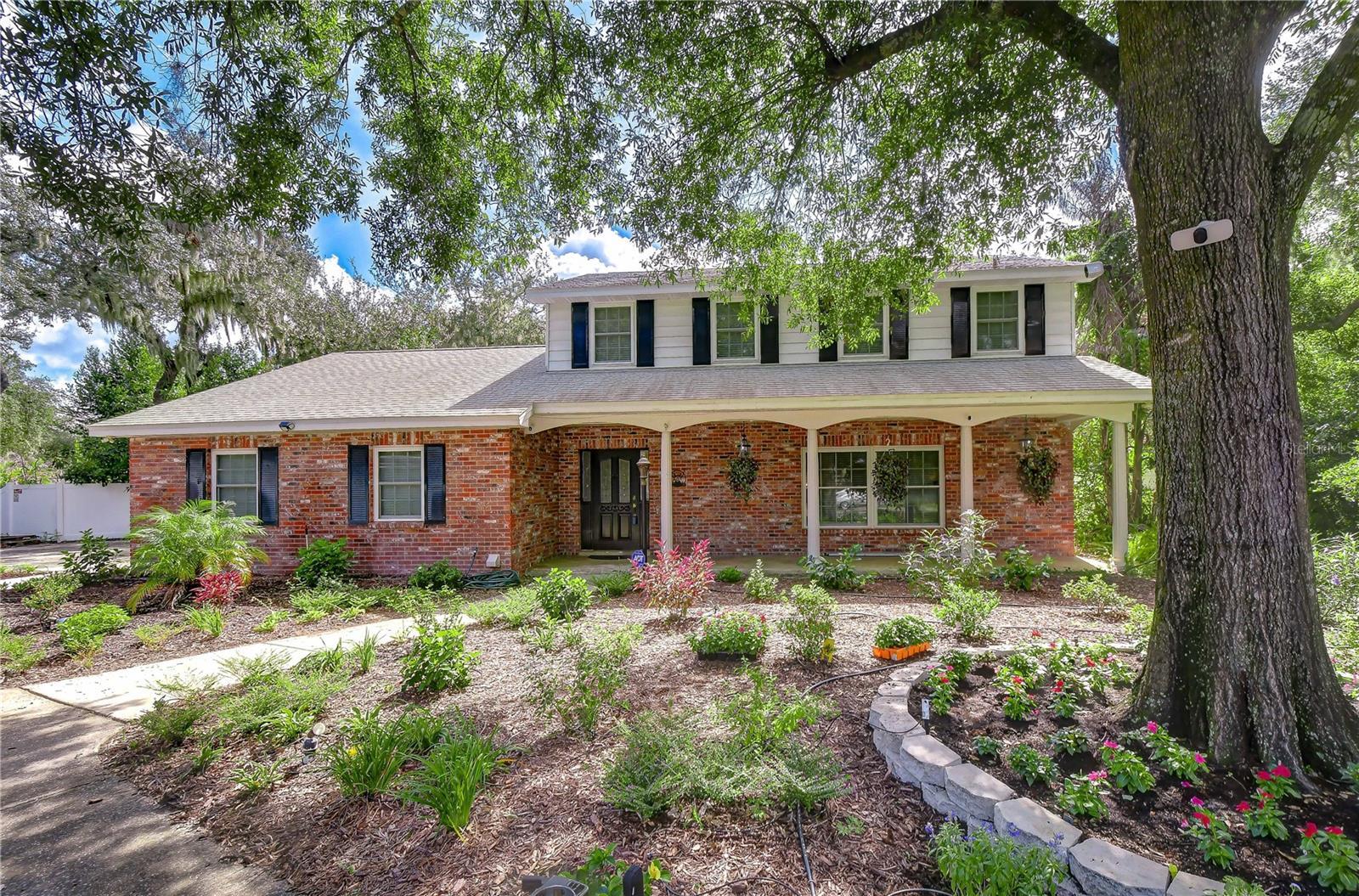 Beautifully updated Brandon home situated on more than half an acre of lush, private grounds