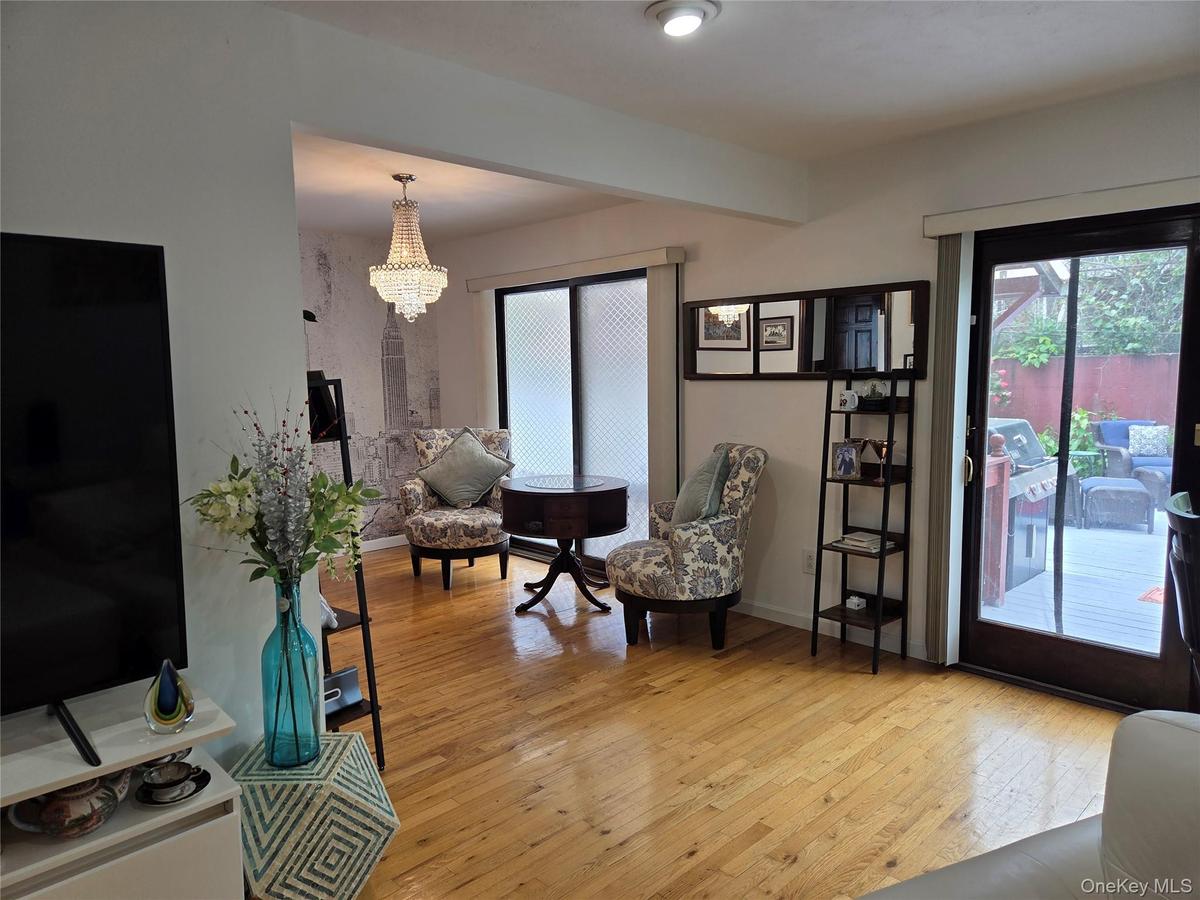 Living Room with Sliding Door Leading to the Deck