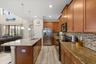 Kitchen with granite countertops and stainless steel applicances